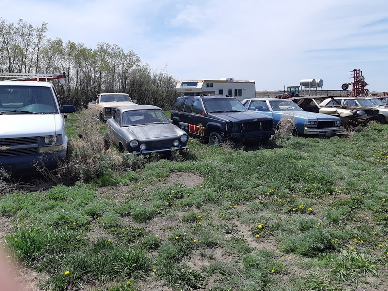 Illustration for article titled Farmyard cars I found this week. (none of which are late model Corvairs)